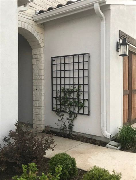 use an over the door metal trellis inside house|wall mounted trellis ideas.